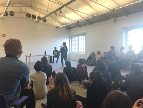 audience watching event at Tate